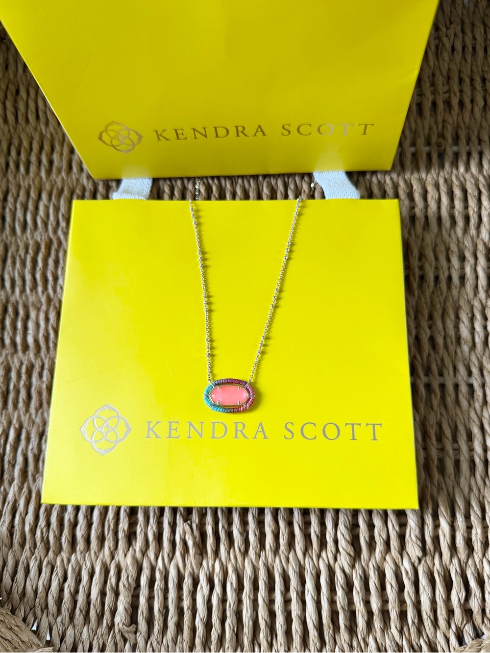 Kendra Scott Gold Necklace with Coral Oval Pendant and Green Accent